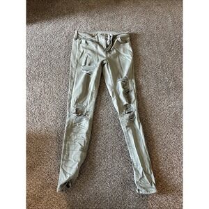 American Eagle Distressed‎ Mid Rise Jeans Size 4